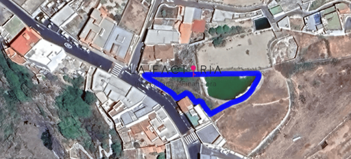 Terreno urbano con estanque en Charco del Pino